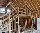 Interior wood framing with studs, joists, and blocking in residential construction